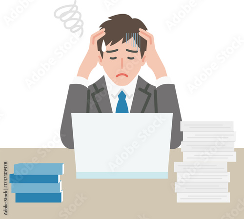 仕事に追われるビジネスマン