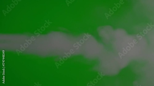 Wispy Cloud Wisps Drifting Across a Vivid Green Screen BG Ready for Compositing Motion Graphics