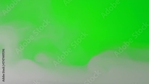 Ethereal White Smoke Wisps Against a Vibrant Green Screen Background Versatile Overlay for Compositing and Design