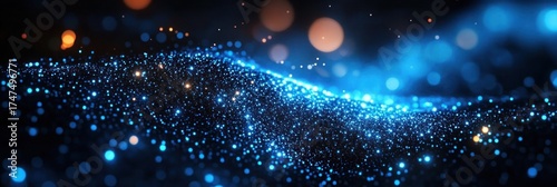 Glowing blue and orange particles forming a dynamic wave-like pattern against a dark background, creating a sense of depth and movement