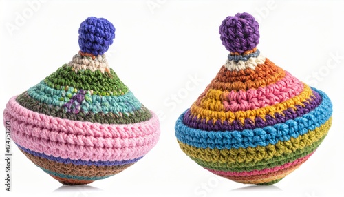 Colorful Knitted Spinning Tops on White Background Handmade Toys Detailed View