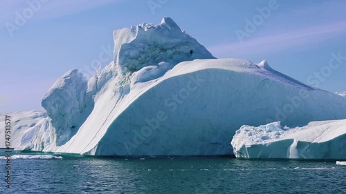 Boat excursion near icebergs of Kangia Fjord and Sermeq Kujalleq glacier in Ilulissat, Greenland