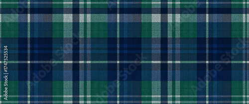 Seamless tartan plaid pattern in blue green and navy tones with Scottish winter fabric texture symmetrical design