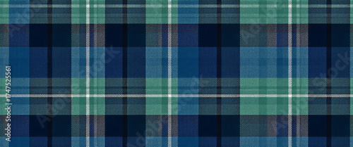 Seamless tartan plaid pattern in blue green and navy tones with Scottish winter fabric texture symmetrical design