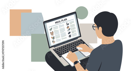 Person Looking at a Meal Plan on a Laptop Computer in a Healthy Lifestyle Concept