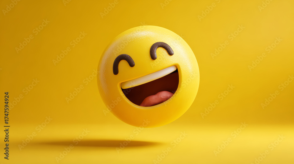 Fototapeta premium Laughing yellow emoji face with joyful expression floating on yellow background