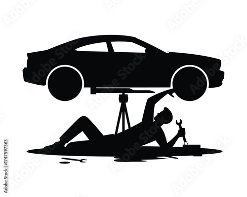 Black silhouette of mechanic working under vehicle repair wrench