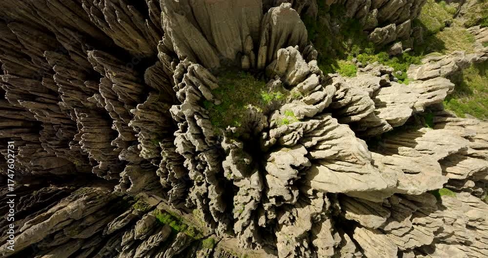 Rock formations in Valle de las Animas, Valley of the Souls, unique geological spires and abstract patterns near La Paz, Bolivia. Aerial top-down descending
