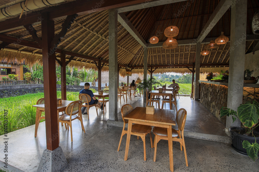 Fototapeta premium Restaurant with a lot of tables and chairs