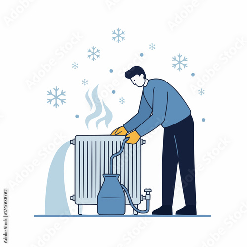 Man draining radiator in winter