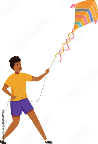 Young boy having fun playing with kite, enjoying outdoor leisure activity