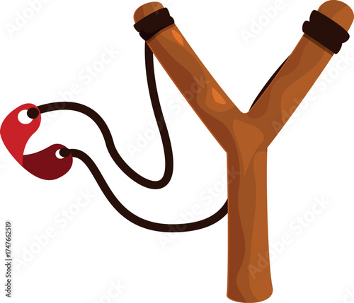 Classic wooden slingshot with red rubber band, ready for launching projectiles