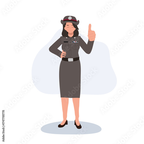 a female Thai police officer in uniform giving a thumbs up