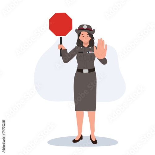 female police officer directing traffic stop gesture. thailand policewoman