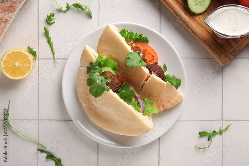 Plate of delicious pitas wi...