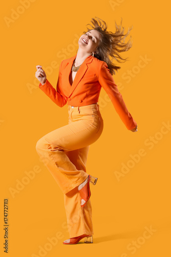 Happy young woman in stylis...