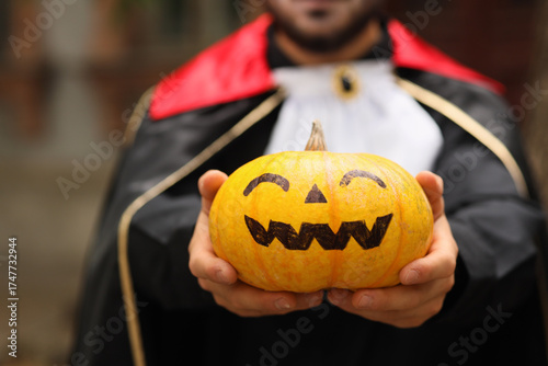 Young man dressed as vampir...