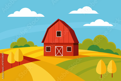 Red barn in a countryside landscape with blue sky