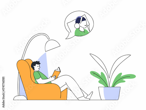 Person reading a book in an armchair with headphones