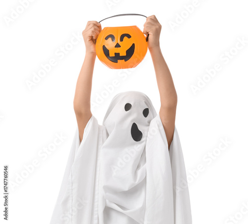 Little boy dressed as ghost...