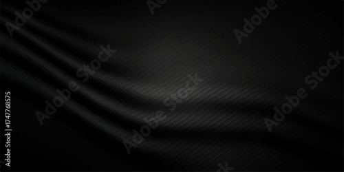 Luxury dark black silk satin fabric material with a smooth and textured surface design pattern for a fashion backdrop