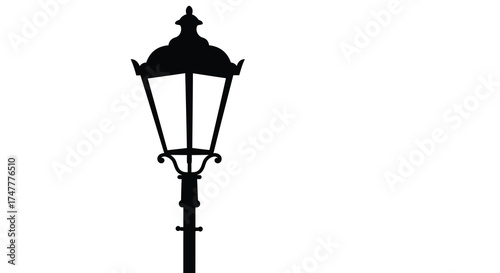 Silhouette of an antique street lamp post with ornate detailing evoking historical charm and vintage ambiance silhouette