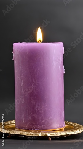 Wallpaper Mural Burning purple candle on a gold plate against a dark background Torontodigital.ca