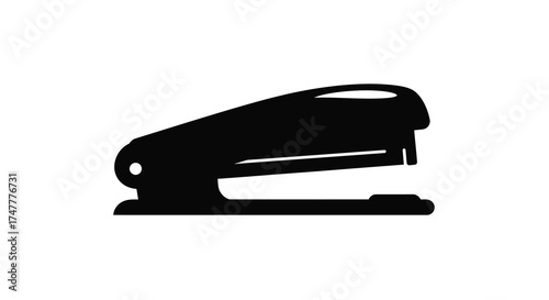 Clean silhouette icon of a black office stapler isolated on a for versatile design use silhouette