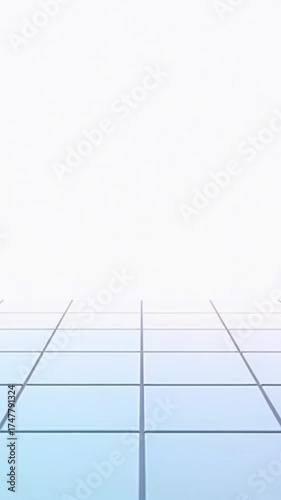 Wallpaper Mural A minimalist scene featuring a smooth, light blue tiled floor with a white background. The tiles create a grid pattern, emphasizing simplicity and space. Torontodigital.ca