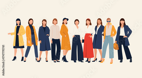 A diverse group of women in stylish professional attire posing together.