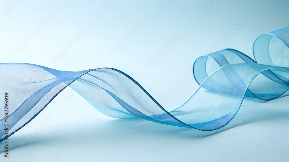 Obraz premium Elegant blue ribbon flowing gracefully creates a modern abstract design on light blue background