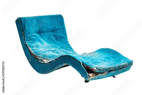 Old damaged turquoise chaise lounge with torn upholstery.
