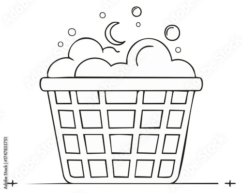 Laundry basket overflowing with soap suds and bubbles with a crescent moon symbol