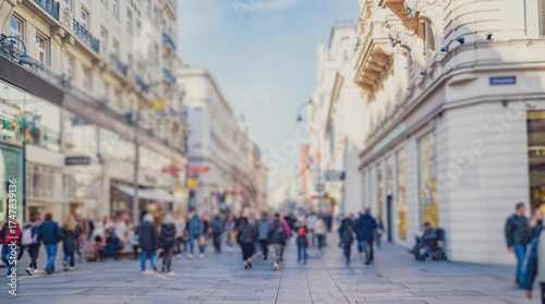 Crowd of anonymous people walking on busy city street