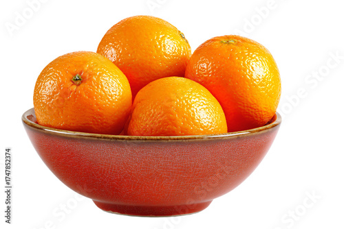 A rustic red ceramic bowl filled with four fresh ripe oranges.
