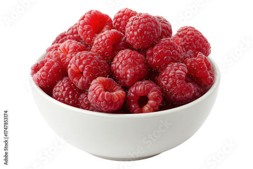 A white ceramic bowl overflowing with fresh red raspberries.