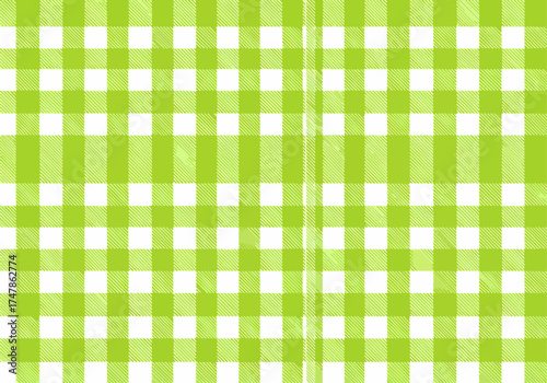 Seamless green plaid pattern fabric texture, a vintage tartan cloth design for textile or picnic tablecloth