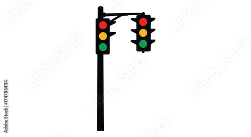Dual traffic light signal pole illuminated with red yellow and green lights guiding urban roadway traffic silhouette