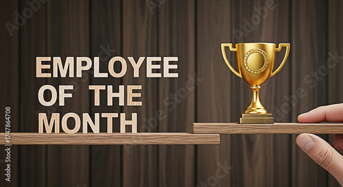 Employee of the month award trophy on a shelf with a hand reaching for it