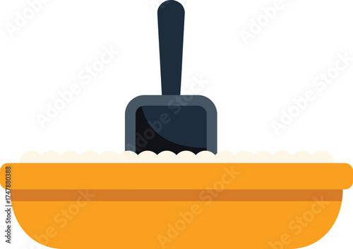 Sandbox with shovel standing in sand representing summer, childhood and outdoor playing