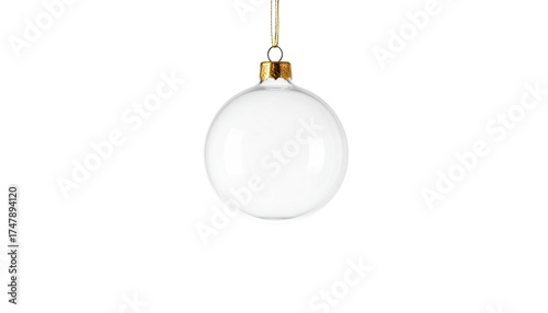 A plain white Christmas ornament, hanging by a golden loop against black