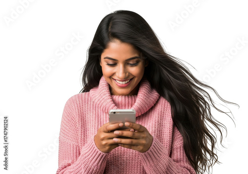 Young woman smiling while looking at her phone isolated on transparent background