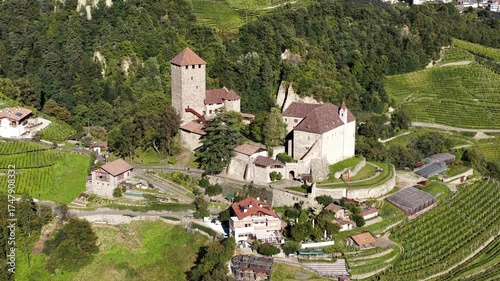 Tyrol Castle Schloss Tirol or Castel Tirolo, in South Tyrol, Italy, aerial video