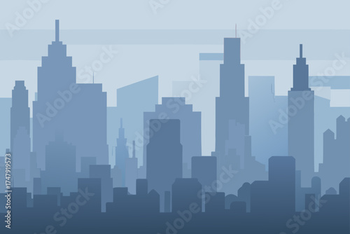 Silhouette of a city skyline against a hazy sky