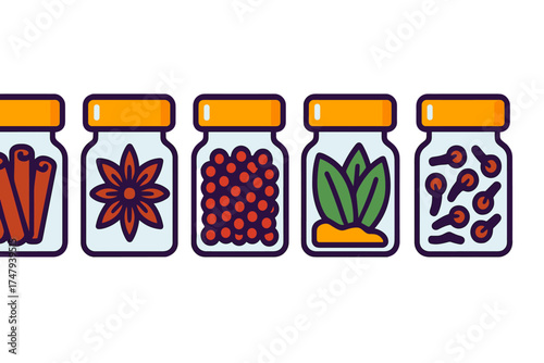 Assortment of aromatic spices and dried herbs stored in glass jars with orange lids