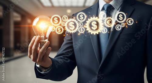 Powerful businessman holding bright idea generating innovative financial solutions