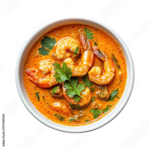 Spicy Shrimp Curry in Coconut Sauce with Fresh Herbs and Vegetables on transparent background