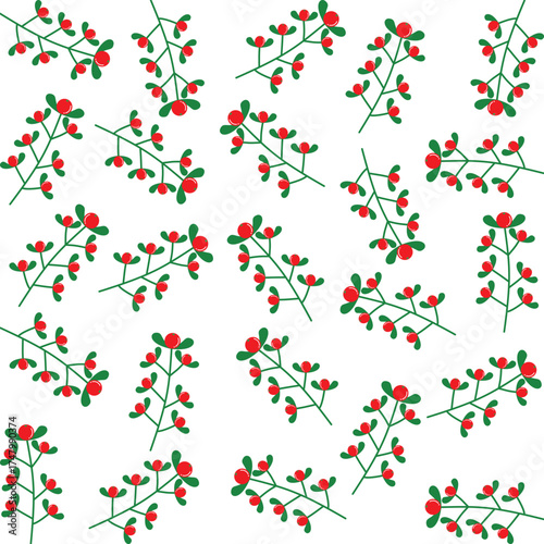 Green leaves with bright red berries on white background bring a fresh and cozy winter vibe.
