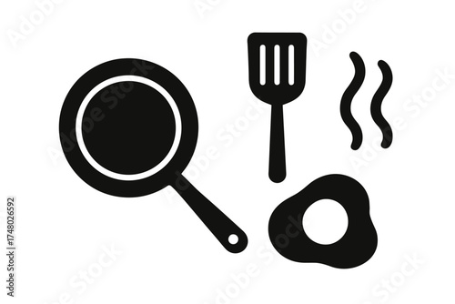 Frying pan, spatula, and fried egg icon set on white background