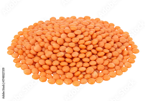 Isolated pile of reddish orange uncooked lentils on a neutral backdrop, healthy grains heap